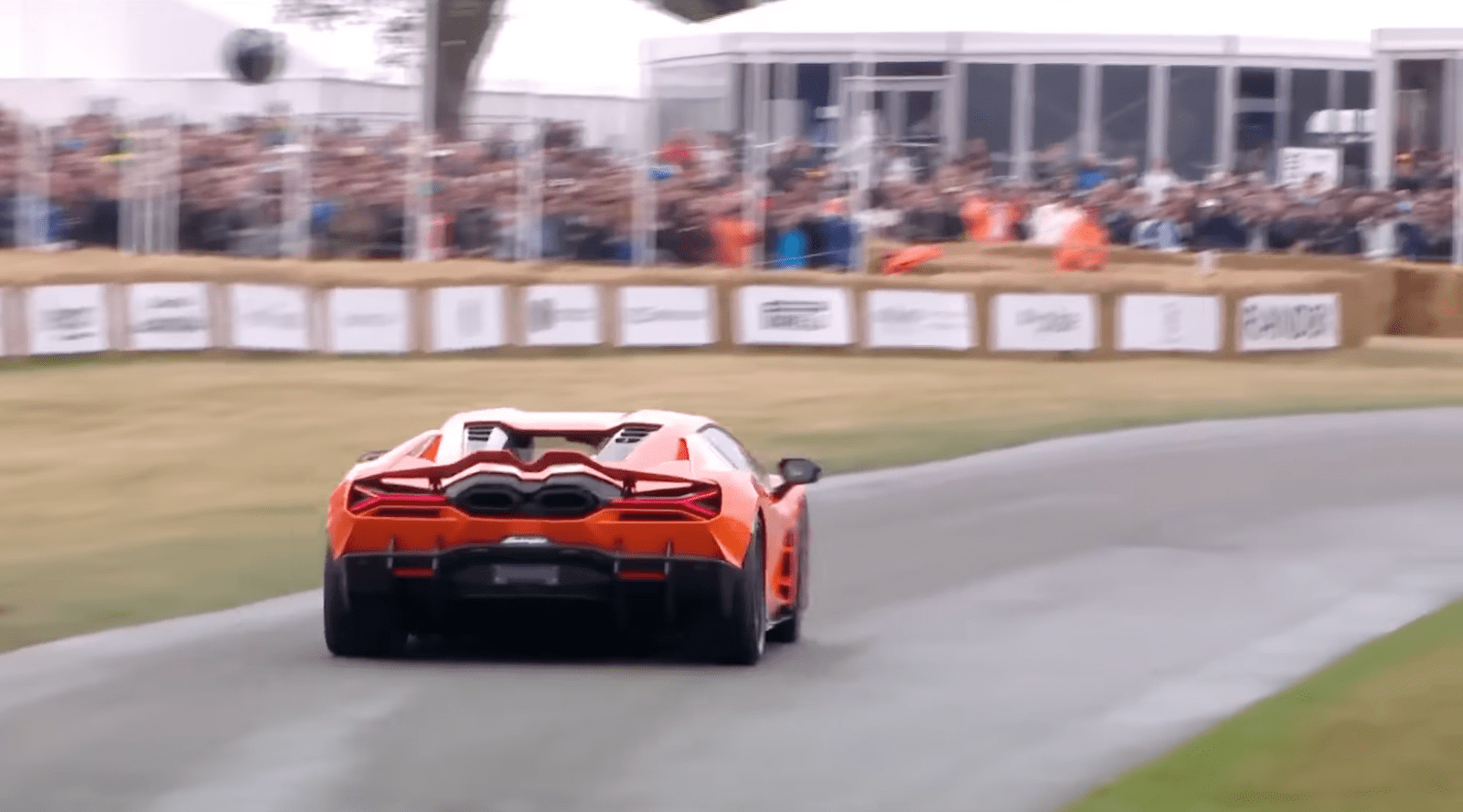 Lamborghini Revuelto Scrambles for Traction on Wet Goodwood Hill Climb (video)